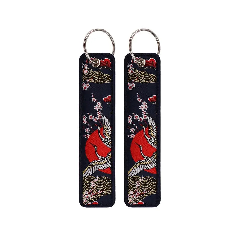 Porte-clé Grues et Soleil Rouge Nuit Profonde #08